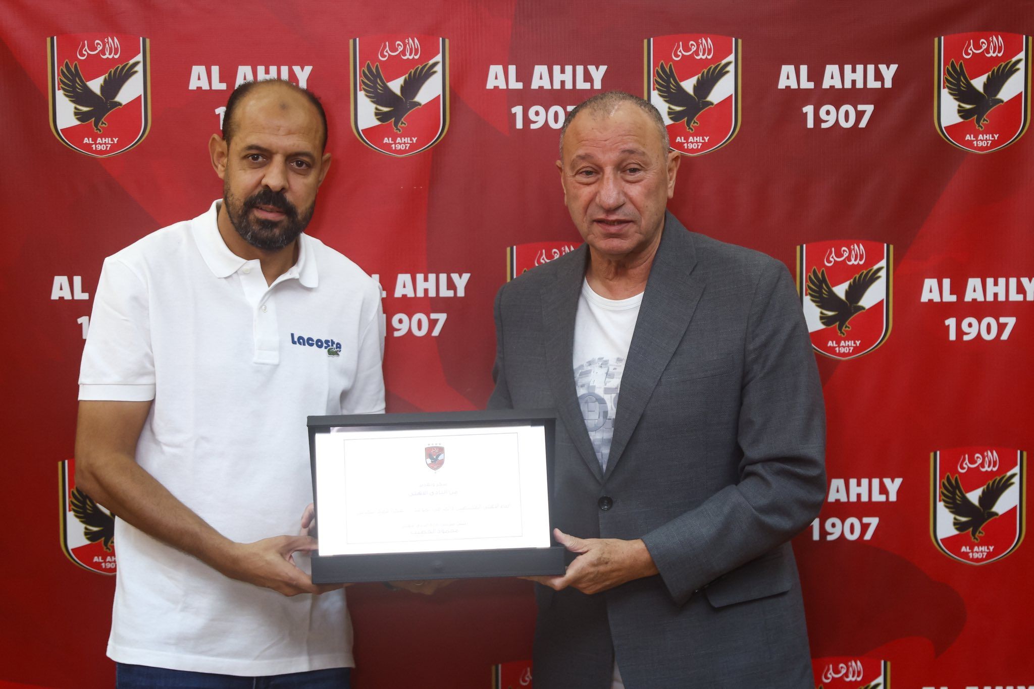 May be an image of text that says 'الأهلى AL AWιΥ الأزهلى AL AHLY HLY الأملى AL AHLY 190 ANLY الأهلى AL AHLY 1907 ALAHLY AL AHLY 907 الأملى ALAHLY AL AHL 1907 사생바니Y الأهلى AHLY 1907 씨산트Y الزهلى'