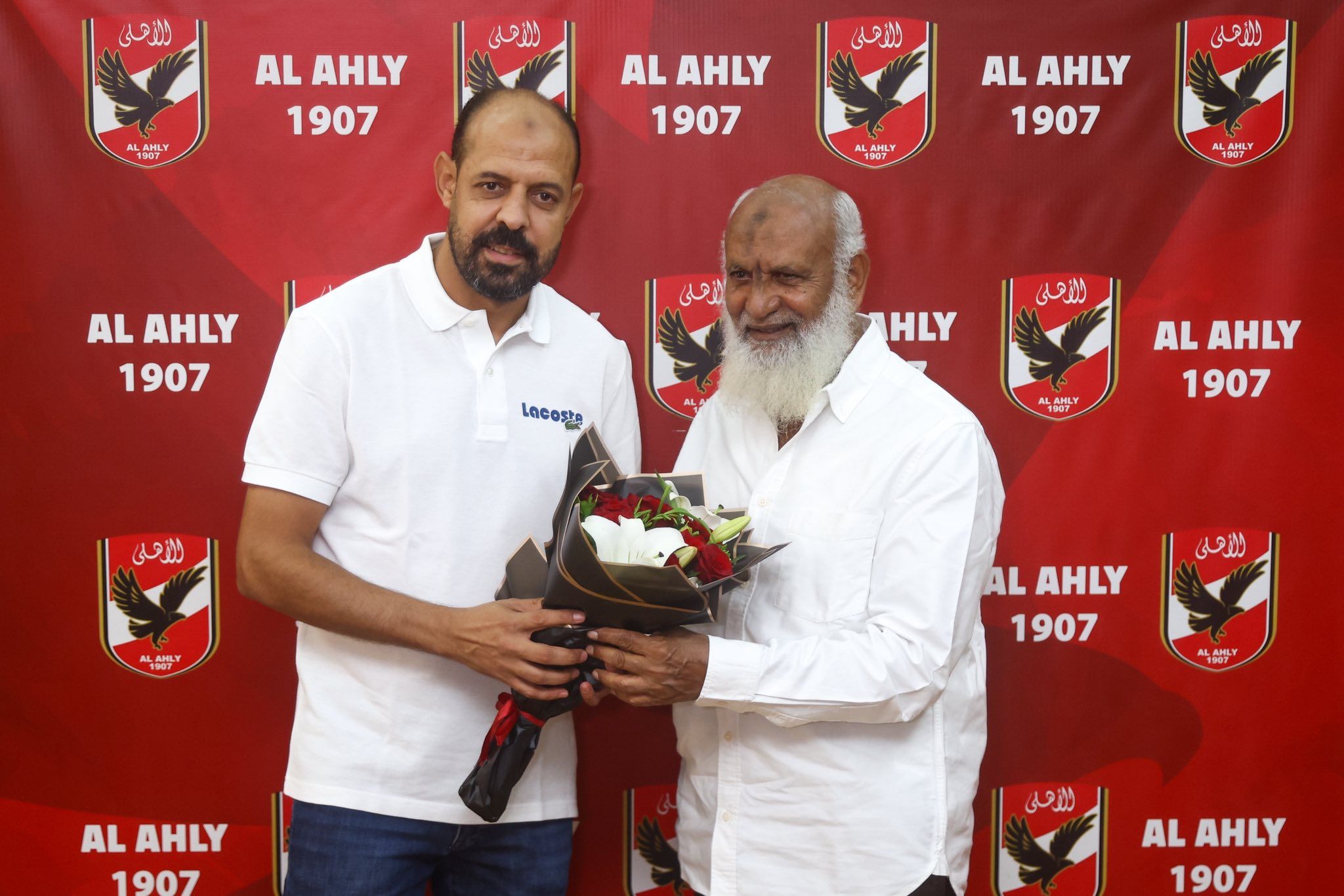 May be an image of text that says 'اللأهلى الأهلى AL AHLY 1907 식이삼D토Y الأهلی AL AHLY 1907 الزهلى AL AHLY 1907 산력Y AL AHLY 1907 الأهلي الأهلى HLY الزهلی AL AHLY 1907 الأهلى AL AHLY 1907 AL AHLY 1907 الأهلى ALAHLY AL AHLY 1907'