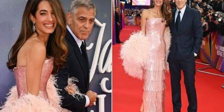 أمل
      كلوني
      تخطف
      الأضواء
      من
      زوجها
      جورج
      في
      عرض
      فيلمه
      الجديد