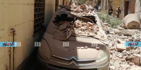 تحطم سيارة عقب سقوط أجزاء من عقار شرق الإسكندرية