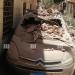 تحطم سيارة عقب سقوط أجزاء من عقار شرق الإسكندرية