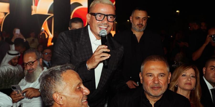 عمرو دياب يضيء ليل أبوظبي بأروع أغانيه في حفل خاص.. صور